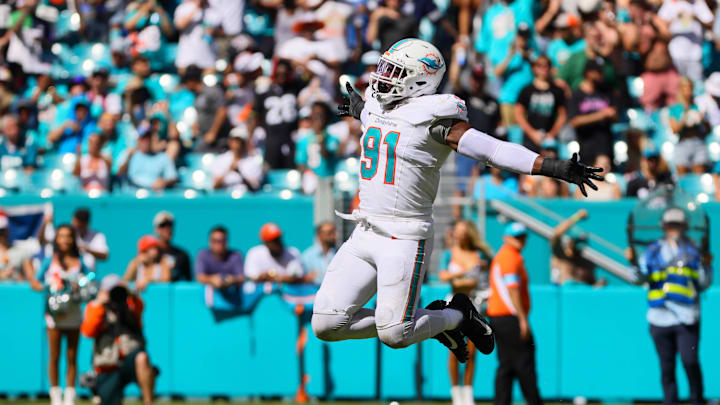 Miami Dolphins linebacker Emmanuel Ogbah (91) celebrates after sacking Jacksonville Jaguars quarterback Trevor Lawrence (not pictured) during the fourth quarter at Hard Rock Stadium in the season opener.