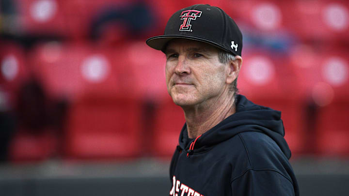 Texas Tech's head baseball coach Tim Tadlock walks back to the dugout before the game against Air