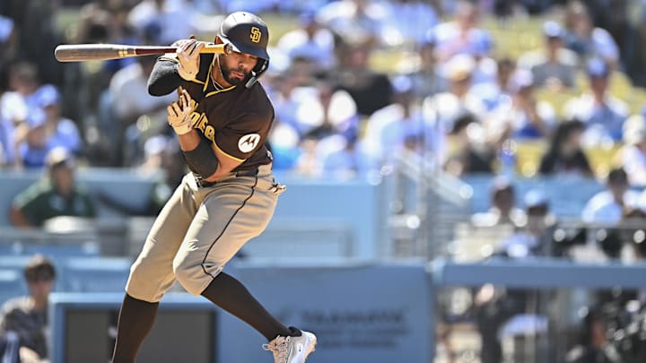 Aug 17, 2025; Los Angeles, California, USA; San Diego Padres shortstop Xander Bogaerts (2) reacts after being hit by a pitch against the Los Angeles Dodgers during the eighth inning at Dodger Stadium. Mandatory Credit: Jonathan Hui-Imagn Images