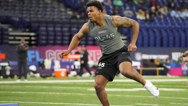Penn State defensive lineman Chop Robinson (DL45) works out during the 2024 NFL Combine at Lucas Oil Stadium.