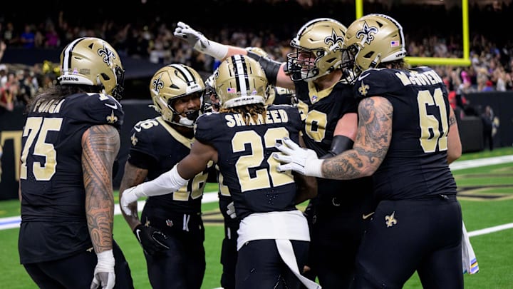Oct 13, 2024; New Orleans, Louisiana, USA; New Orleans Saints celebrate a touchdown by New Orleans Saints wide receiver Bub Means (16), second left, during the second quarter against the Tampa Bay Buccaneers at Caesars Superdome. Mandatory Credit: Matthew Hinton-Imagn Images Oct 13, 2024; New Orleans, Louisiana, USA; New Orleans Saints celebrate a touchdown by New Orleans Saints wide receiver Bub Means (16), second left, during the second quarter against the Tampa Bay Buccaneers at Caesars Superdome. Mandatory Credit: Matthew Hinton-Imagn Images