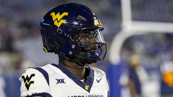 Oct 3, 2025; Provo, Utah, USA; West Virginia Mountaineers quarterback Khalil Wilkins (14) looks on before the game against the Brigham Young Cougars at LaVell Edwards Stadium. Mandatory Credit: Rob Gray-Imagn Images Oct 3, 2025; Provo, Utah, USA; West Virginia Mountaineers quarterback Khalil Wilkins (14) looks on before the game against the Brigham Young Cougars at LaVell Edwards Stadium. Mandatory Credit: Rob Gray-Imagn Images