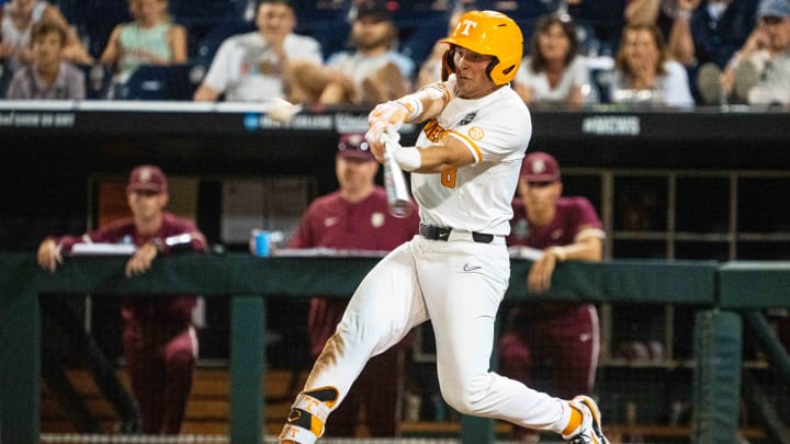 Jun 14, 2024; Omaha, NE, USA; Tennessee Volunteers left fielder Dylan Dreiling (8) hits a walk-off single against the Florida State Seminoles during the ninth inning at Charles Schwab Filed Omaha. Mandatory Credit: Dylan Widger-USA TODAY Sports Jun 14, 2024; Omaha, NE, USA; Tennessee Volunteers left fielder Dylan Dreiling (8) hits a walk-off single against the Florida State Seminoles during the ninth inning at Charles Schwab Filed Omaha. Mandatory Credit: Dylan Widger-USA TODAY Sports