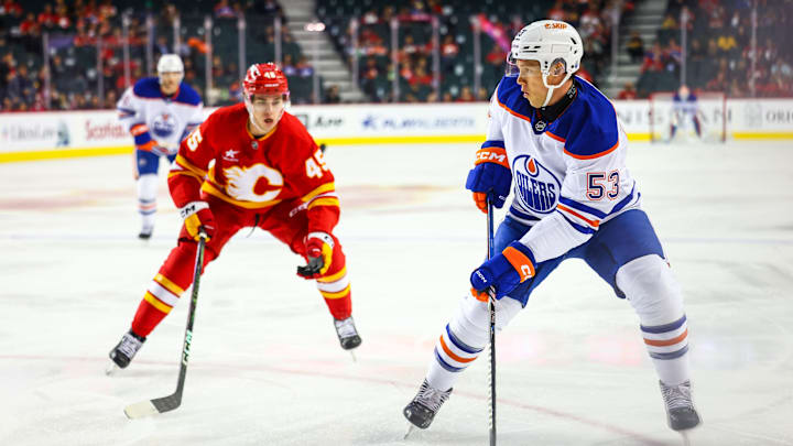 Sep 23, 2024; Calgary, Alberta, CAN; Edmonton Oilers center Jeff Skinner (53) controls the puck against the Calgary Flames during the first period at Scotiabank Saddledome. Mandatory Credit: Sergei Belski-Imagn Images