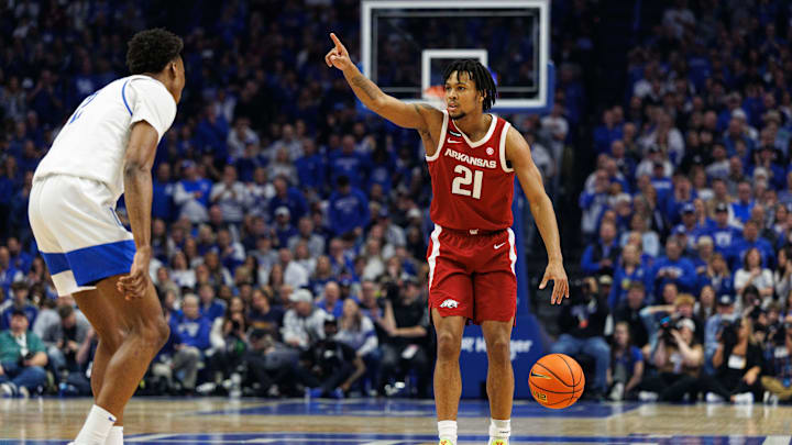 Feb 1, 2025; Lexington, Kentucky, USA; Arkansas Razorbacks guard D.J. Wagner (21) brings the ball up court during the first half against the Kentucky Wildcats at Rupp Arena at Central Bank Center. Mandatory Credit: Jordan Prather-Imagn Images