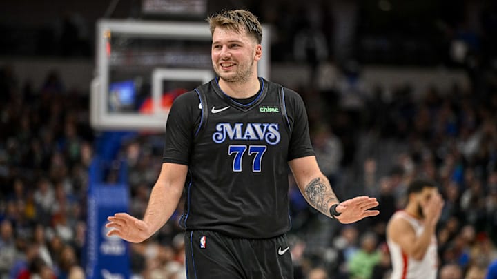 Nov 28, 2023; Dallas, Texas, USA; Dallas Mavericks guard Luka Doncic (77) reacts to a foul call