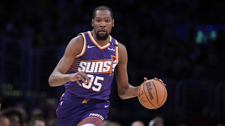 Mar 16, 2025; Los Angeles, California, USA; Phoenix Suns forward Kevin Durant (35) dribbles the ball against the Los Angeles Lakers in the second half at Crypto.com Arena. Mandatory Credit: Kirby Lee-Imagn Images Mar 16, 2025; Los Angeles, California, USA; Phoenix Suns forward Kevin Durant (35) dribbles the ball against the Los Angeles Lakers in the second half at Crypto.com Arena. Mandatory Credit: Kirby Lee-Imagn Images