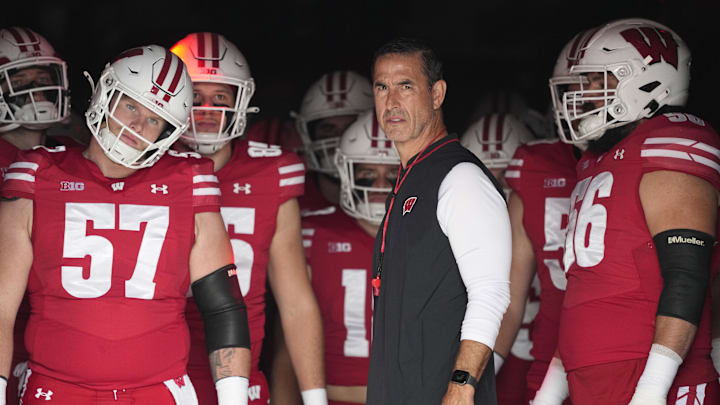 Oct 18, 2025; Madison, Wisconsin, USA;  Wisconsin Badgers head coach Luke Fickell during warmups prior to the game against the Ohio State Buckeyes at Camp Randall Stadium.