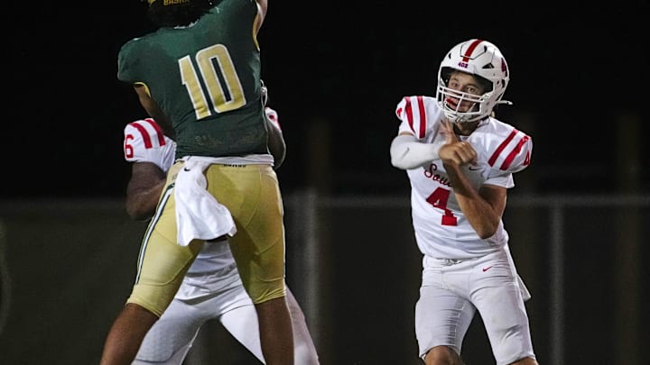 Millard South Jett Thomalla (4) passes against pressure from Basha defensive end Darian (Bleu) Dantzler (10) during a game at Basha High School in Chandler on Aug. 30, 2024.