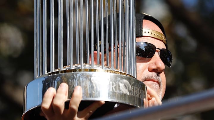 Nov 2, 2019; Washington, DC, USA; Washington Nationals general manager Mike Rizzo holds the Commissioners Trophy before the start of the World Series championship parade in downtown Washington, DC. 