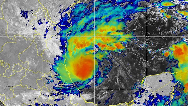 Tropical Storm Milton on satellite just before 2 p.m. on Saturday, Oct. 5, 2024. The current National Hurricane Center forecast projects Milton to become a strong Category 2 storm, making landfall Wednesday with 110 mph sustained winds.