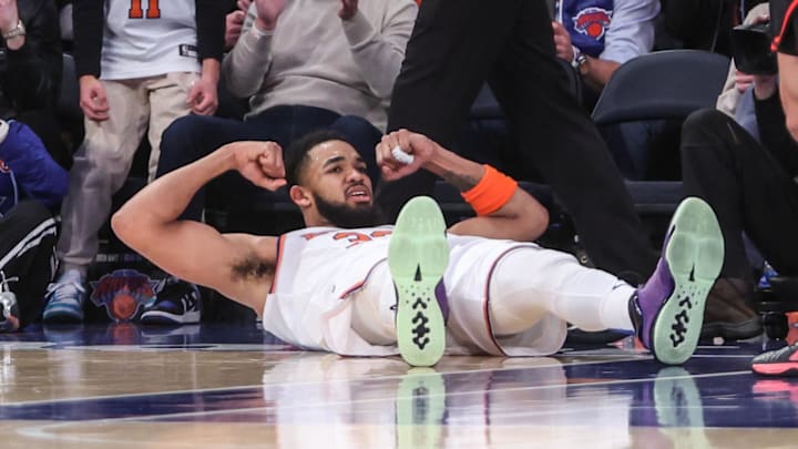 Feb 12, 2025; New York, New York, USA;  New York Knicks center Karl-Anthony Towns (32) reacts after getting fouled on a made basket in the third quarter against the Atlanta Hawks at Madison Square Garden. Mandatory Credit: Wendell Cruz-Imagn Images
