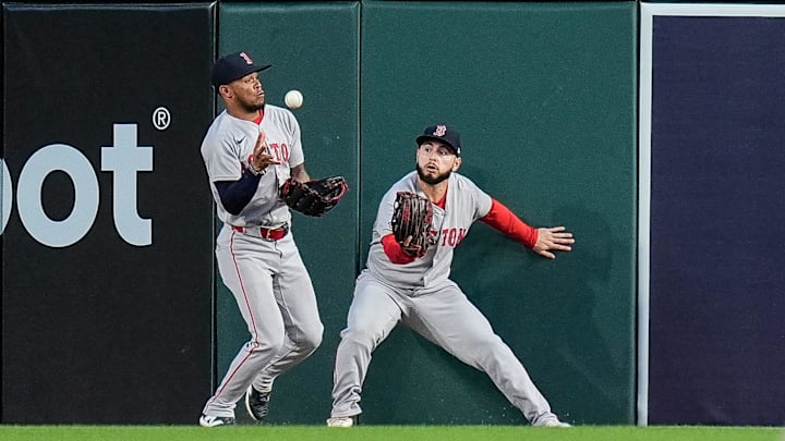 Boston Red Sox center fielder Ceddanne Rafaela (3), left, catches for a fly out against Detroit Tigers designated hitter Kerry Carpenter (30) during the seventh inning at Comerica Park in Detroit on Wednesday, May 14, 2025.