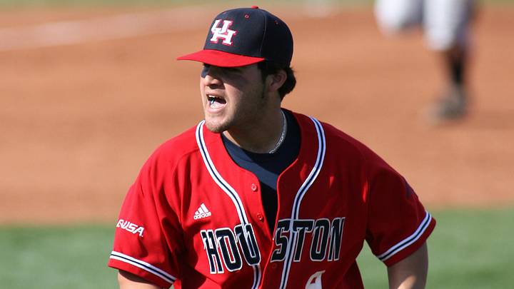 Feb 19, 2006; Tempe, AZ, USA; Houston Cougars pitcher (9) Luis Flores celebrates after striking out two Arizona State Sun Devils batters with bases loaded in the fifth inning at Packard Stadium. Mandatory Credit: Rick Scuteri-Imagn Images Copyright Rick Scuteri