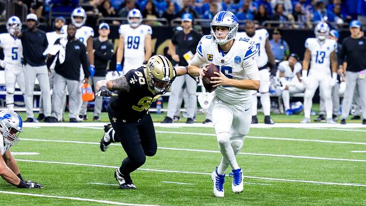 Dec 3, 2023; New Orleans, Louisiana, USA; Detroit Lions quarterback Jared Goff (16) scrambles out the pocket against New Orleans Saints defensive end Carl Granderson (96) during the first half at the Caesars Superdome. Mandatory Credit: Stephen Lew-USA TODAY Sports Dec 3, 2023; New Orleans, Louisiana, USA; Detroit Lions quarterback Jared Goff (16) scrambles out the pocket against New Orleans Saints defensive end Carl Granderson (96) during the first half at the Caesars Superdome. Mandatory Credit: Stephen Lew-USA TODAY Sports