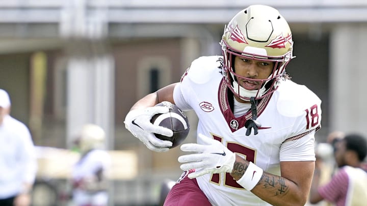 Apr 20, 2024; Tallahassee, Florida, USA; Florida State Seminoles tight end Landen Thomas (17) runs with the ball during the Spring Showcase at Doak S. Campbell Stadium. Mandatory Credit: Melina Myers-Imagn Images
