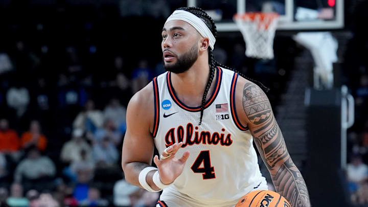 Mar 19, 2026; Greenville, SC, USA; Illinois Fighting Illini guard Kylan Boswell (4) dribbles the ball against the Penn Quakers in the second half of a first round game of the men's 2026 NCAA Tournament at Bon Secours Wellness Arena. Mandatory Credit: Jim Dedmon-Imagn Images