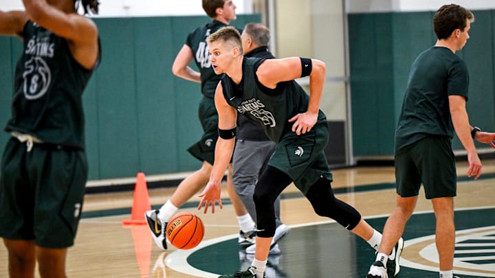Michigan State's Jaxon Kohler moves with the ball during the first day of basketball practice on Monday, Sept. 22, 2025, at the Breslin Center in East Lansing.