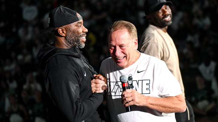 Michigan State men's basketball head coach Tom Izzo, center, former MSU players Mateen Cleaves, left, and Jason Richardson greet Izzo during the Michigan State Madness event on Friday, Oct. 4, 2024, at the Breslin Center in East Lansing.
