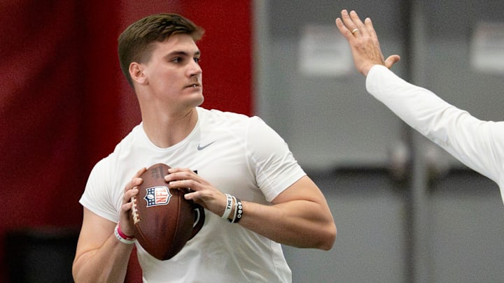 March 25, 2026; Tuscaloosa, AL, USA; Quarterback Ty Simpson throws during Pro Day in the Hank Crisp Indoor Practice Facility at the University of Alabama. March 25, 2026; Tuscaloosa, AL, USA; Quarterback Ty Simpson throws during Pro Day in the Hank Crisp Indoor Practice Facility at the University of Alabama.