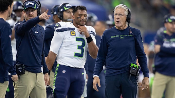Sep 12, 2021; Indianapolis, Indiana, USA; Seattle Seahawks quarterback Russell Wilson (3) and head coach Pete Carroll on the sideline in the first quarter against the Indianapolis Colts at Lucas Oil Stadium. Mandatory Credit: Trevor Ruszkowski-Imagn Images