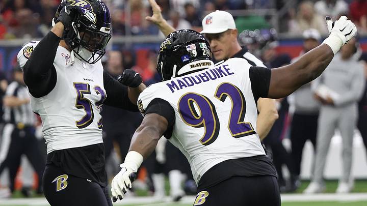 Dec 25, 2024; Houston, Texas, USA; Baltimore Ravens defensive tackle Nnamdi Madubuike (92) celebrates  linebacker Kyle Van Noy (53) sack against Houston Texans quarterback C.J. Stroud (7) (not pictured) in the first quarter at NRG Stadium. Mandatory Credit: Thomas Shea-Imagn Images