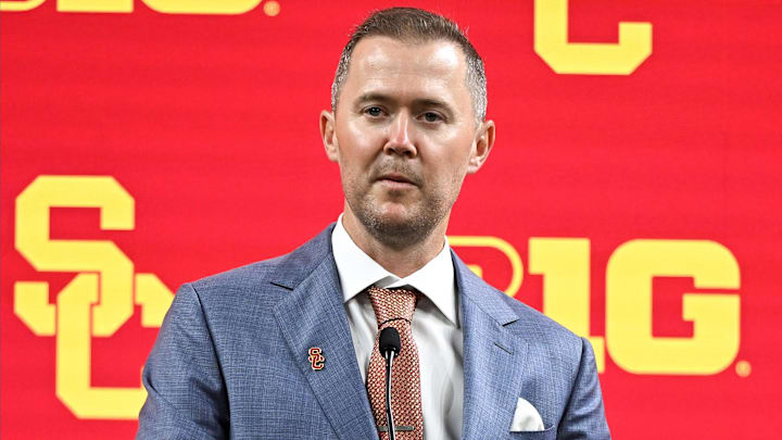 Jul 24, 2024; Indianapolis, IN, USA; USC Trojans head coach Lincoln Riley speaks to the media during the Big 10 football media day at Lucas Oil Stadium. Mandatory Credit: Robert Goddin-Imagn Images Jul 24, 2024; Indianapolis, IN, USA; USC Trojans head coach Lincoln Riley speaks to the media during the Big 10 football media day at Lucas Oil Stadium. Mandatory Credit: Robert Goddin-Imagn Images