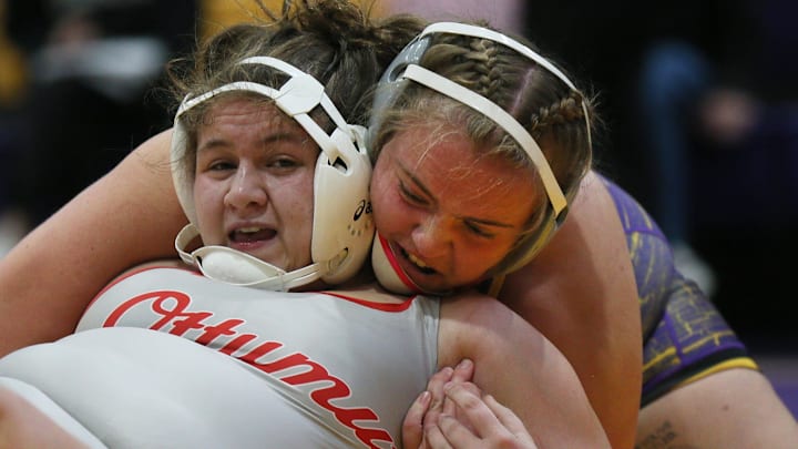 Nevada’s MacKenzie Arends takes down Ottumwa’s Aelilah Subsin during their 235 -pound in the Central Iowa Girls Wrestling Kickoff Tournament at Nevada High School gym on Saturday, Nov. 23, 2024, in Nevada, Iowa.