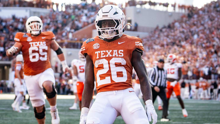 Dec 21, 2024; Austin, Texas, USA; Texas Longhorns running back Quintrevion Wisner (26) celebrates after scoring a touchdown in the second quarter against the Clemson Tigers at Darrell K Royal Texas Memorial Stadium. Mandatory Credit: Sara Diggins-Imagn Images