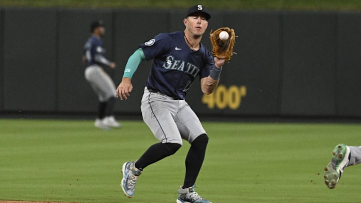 Seattle Mariners second baseman Dylan Moore catches a line drive during a game against the St. Louis Cardinals on Sept. 6 at Busch Stadium. Seattle Mariners second baseman Dylan Moore catches a line drive during a game against the St. Louis Cardinals on Sept. 6 at Busch Stadium.