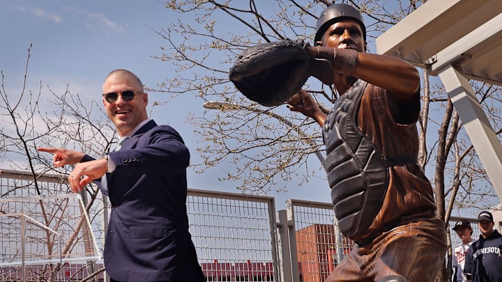 Former catcher for the Minnesota Twins Joe Mauer poses for a photo with the new statue of him unveiled Sunday, April 13, 2025, at Target Field in Minneapolis. Former catcher for the Minnesota Twins Joe Mauer poses for a photo with the new statue of him unveiled Sunday, April 13, 2025, at Target Field in Minneapolis.