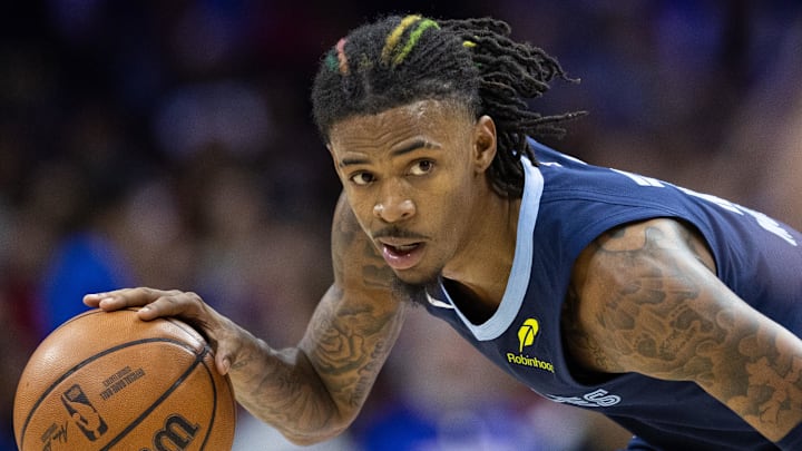 Nov 2, 2024; Philadelphia, Pennsylvania, USA; Memphis Grizzlies guard Ja Morant (12) controls the ball against the Philadelphia 76ers during the third quarter at Wells Fargo Center. Mandatory Credit: Bill Streicher-Imagn Images
