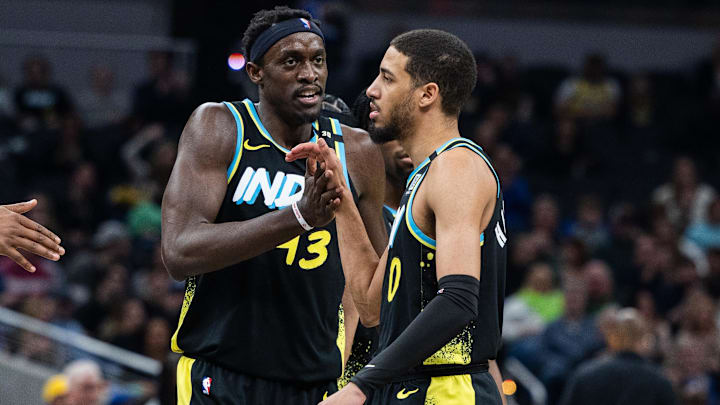 Mar 16, 2024; Indianapolis, Indiana, USA;  Indiana Pacers forward Pascal Siakam (43) celebrates with guard Tyrese Haliburton (0) in the first half against the Brooklyn Nets at Gainbridge Fieldhouse. Mandatory Credit: Trevor Ruszkowski-Imagn Images