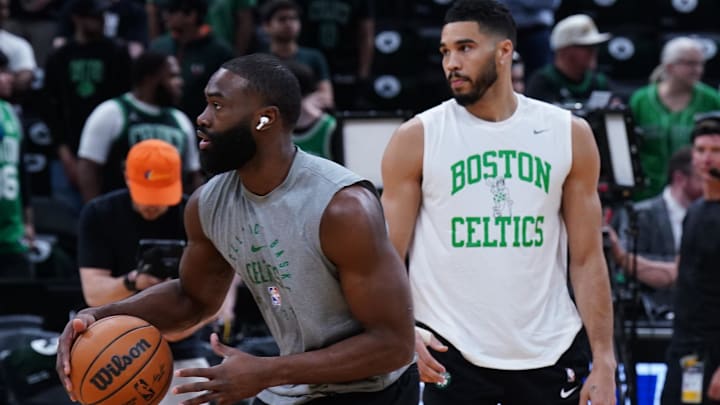 Apr 29, 2025; Boston, Massachusetts, USA; Boston Celtics guard Jaylen Brown (7) and forward Jayson Tatum (0) warm up before game five of first round for the 2025 NBA Playoffs against the Orlando Magic at TD Garden. Mandatory Credit: David Butler II-Imagn Images