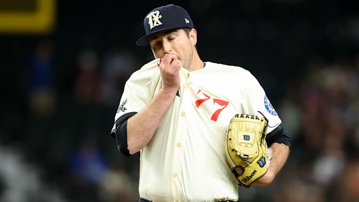 Jun 27, 2025; Arlington, Texas, USA;  Texas Rangers relief pitcher Luke Jackson (77) reacts during the eleventh inning against the Seattle Mariners at Globe Life Field