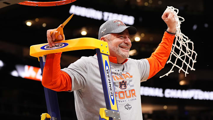 Auburn Tigers head coach Bruce Pearl celebrates by cutting down the nets after winning the South Regional final of the 2025 NCAA tournament. Auburn Tigers head coach Bruce Pearl celebrates by cutting down the nets after winning the South Regional final of the 2025 NCAA tournament.