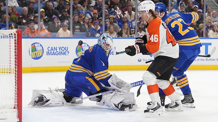 Philadelphia Flyers center Trevor Zegras (46) scores against Buffalo Sabres goalie Ukko-Pekka Luukkonen (1) during the first period at KeyBank Center.  Mandatory Credit: Gregory Fisher-Imagn Images