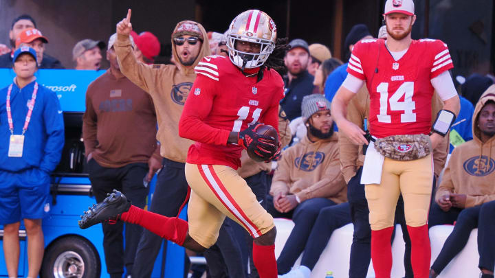 Nov 19, 2023; Santa Clara, California, USA; San Francisco 49ers wide receiver Brandon Aiyuk (11) makes a catch for a 76-yard touchdown against the Tampa Bay Buccaneers during the third quarter at Levi's Stadium. Mandatory Credit: Kelley L Cox-USA TODAY Sports