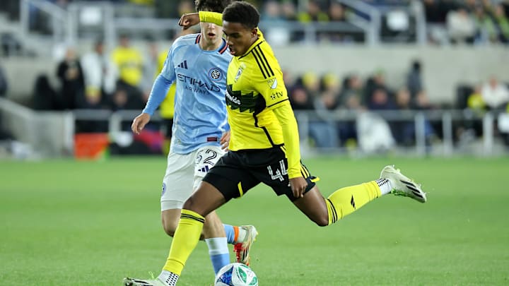 Mar 22, 2025; Columbus, Ohio, USA;  Columbus Crew midfielder Tristan Brown (44) kicks the ball during the second half against the New York City at Lower.com Field. Mandatory Credit: Joseph Maiorana-Imagn Images