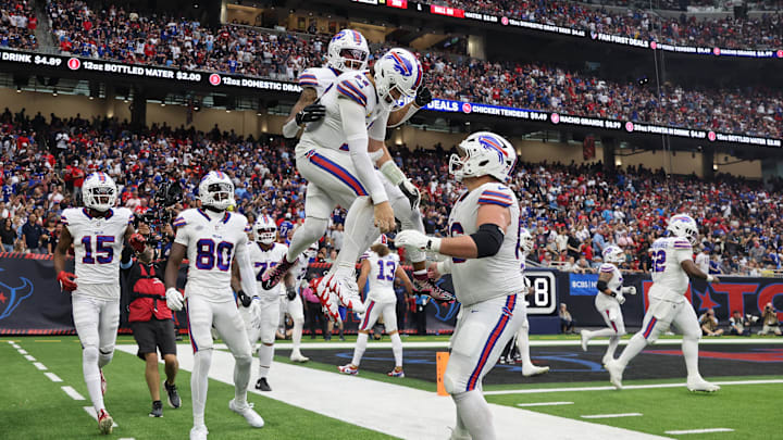 Oct 6, 2024; Houston, Texas, USA; Buffalo Bills quarterback Josh Allen (17) celebrates wide receiver Keon Coleman (0).