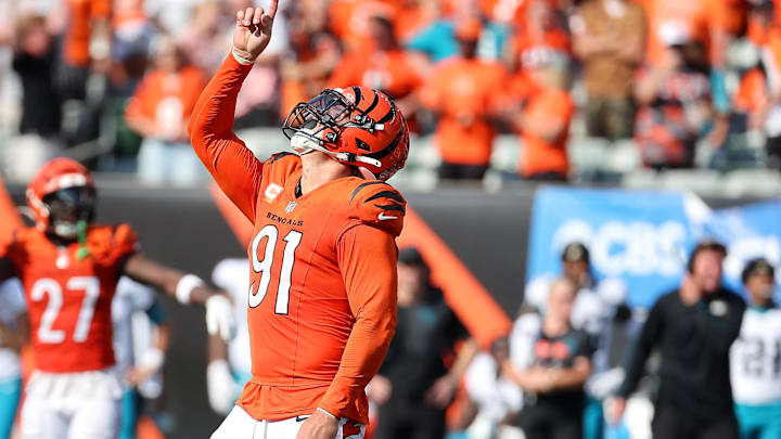 Sep 14, 2025; Cincinnati, Ohio, USA;  Cincinnati Bengals defensive end Trey Hendrickson (91) celebrates his sack during the fourth quarter against the Jacksonville Jaguars at Paycor Stadium. Mandatory Credit: Joseph Maiorana-Imagn Images