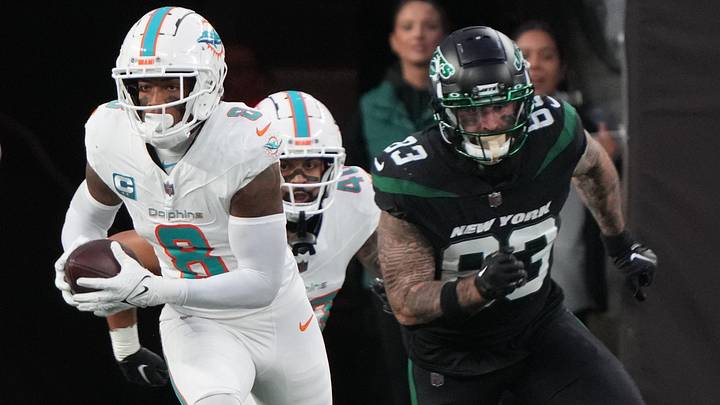 Jevon Holland of Miami returned this interception for a 100-yard TD in the first half as the Miami Dolphins defeated the NY Jets 34-13 at MetLife Stadium on November 24, 2023 in the first-ever Black Friday game. Jevon Holland of Miami returned this interception for a 100-yard TD in the first half as the Miami Dolphins defeated the NY Jets 34-13 at MetLife Stadium on November 24, 2023 in the first-ever Black Friday game.