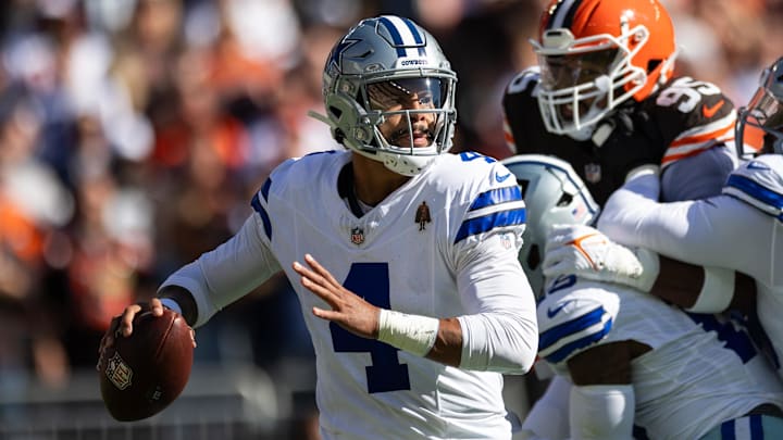  Dallas Cowboys quarterback Dak Prescott looks for an available receiver during the first quarter against the Cleveland Browns.