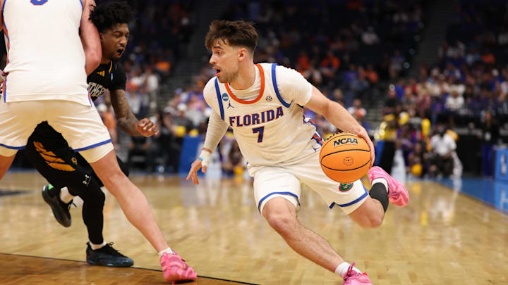 Mar 20, 2026; Tampa, FL, USA; Florida Gators guard Urban Klavzar (7) drives the ball in the second half against the Prairie View A&M Panthers during a first round game of the men's 2026 NCAA Tournament at Benchmark International Arena. Mandatory Credit: Matt Pendleton-Imagn Images