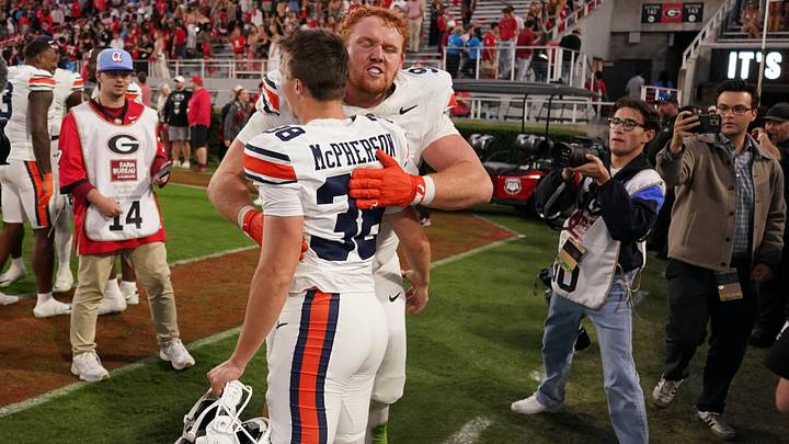 Oct 17, 2026; Athens, Georgia, USA;  Auburn defensive lineman Cody Sigler (94) celebrates with Auburn kicker Alex McPherson (38) following a win over Georgia at Sanford Stadium.  Mandatory Credit: Dale Zanine-Imagn Images