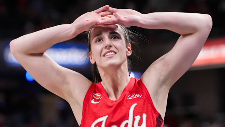 Indiana Fever guard Caitlin Clark (22) reacts Saturday, May 9, 2026, after losing the Fever’s season opener game at Gainbridge Fieldhouse in Indianapolis. The Dallas Wings defeated the Indiana Fever, 107-104.