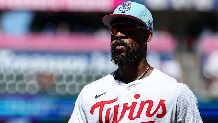 Jul 4, 2025; Minneapolis, Minnesota, USA; Minnesota Twins center fielder Byron Buxton (25) runs back to the dugout during the second inning against the Tampa Bay Rays at Target Field.