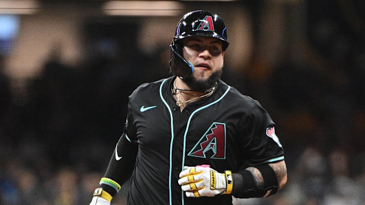 Sep 21, 2024; Milwaukee, Wisconsin, USA; Arizona Diamondbacks catcher Jose Herrera (11) runs around the bases after hitting home run against the Milwaukee Brewers in the fifth inning  at American Family Field. Mandatory Credit: Michael McLoone-Imagn Images