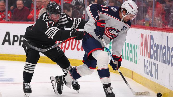 Feb 3, 2026; Newark, New Jersey, USA; Columbus Blue Jackets left wing Miles Wood (11) plays the puck as New Jersey Devils defenseman Simon Nemec (17) defends during the third period at Prudential Center. Mandatory Credit: Ed Mulholland-Imagn Images Feb 3, 2026; Newark, New Jersey, USA; Columbus Blue Jackets left wing Miles Wood (11) plays the puck as New Jersey Devils defenseman Simon Nemec (17) defends during the third period at Prudential Center. Mandatory Credit: Ed Mulholland-Imagn Images
