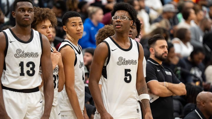 Sierra Canyon’s Bryce James (5), the son of NBA player LeBron James, stands with his teammates by the bench before the game between Sierra Canyon and Bartlett High School.